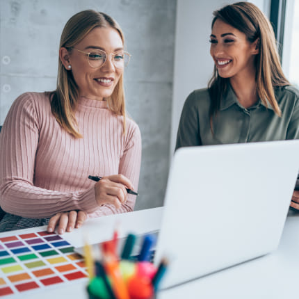 Designers working on a brand book for a client