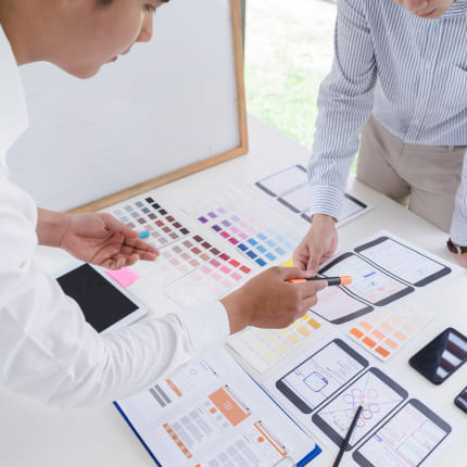 An agency team designs a new logo