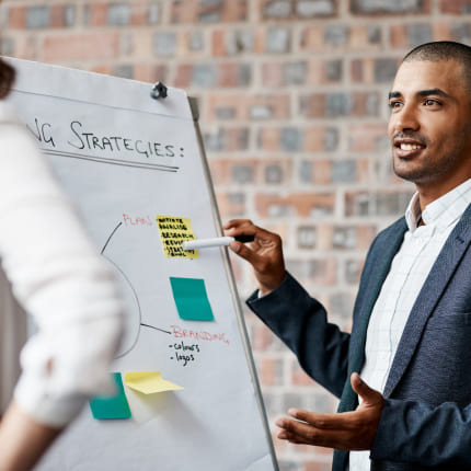 Los Angeles graphic design agency strategist discussing the steps of the collaboration