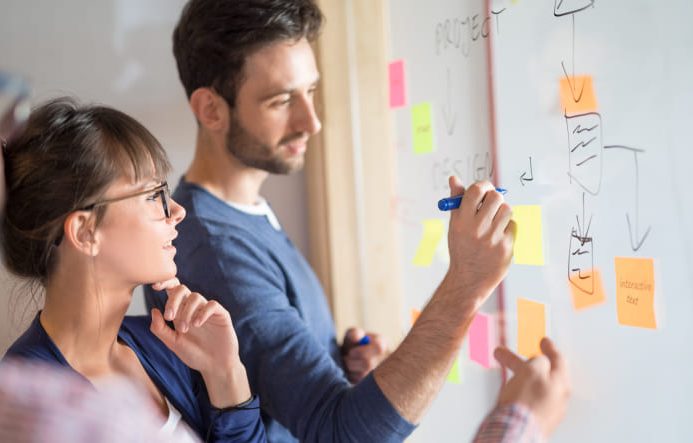 A team works to create a logo design