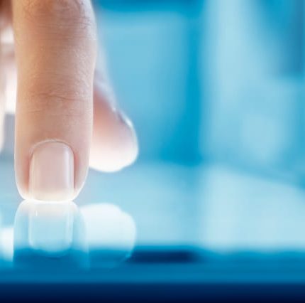 fingers scrolling through gym website on mobile