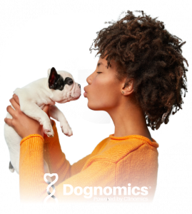 A woman air kisses a white and black dog for Dognomics' lifestyle image