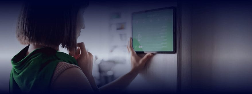 Background image for Enviroseal's case study, showing a woman looking at a tablet