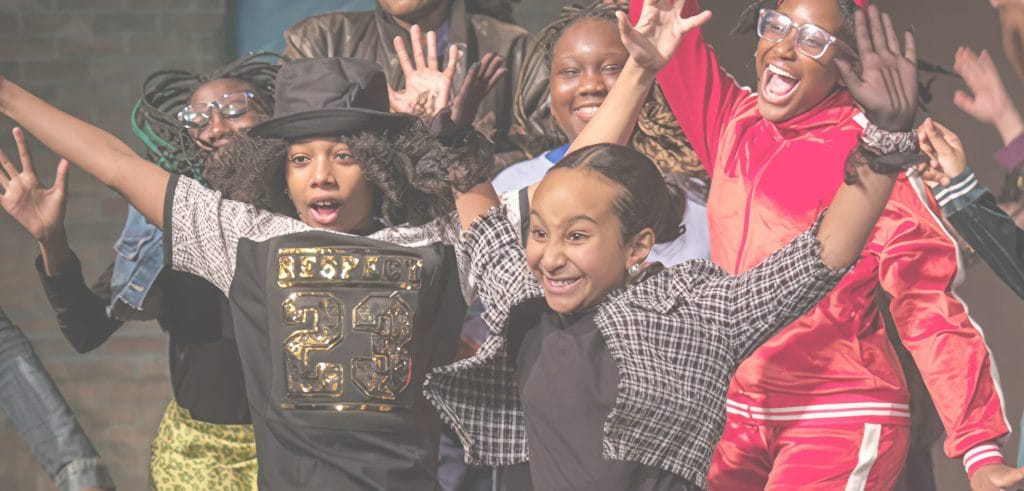 Background image for HSA's case study showing children dancing