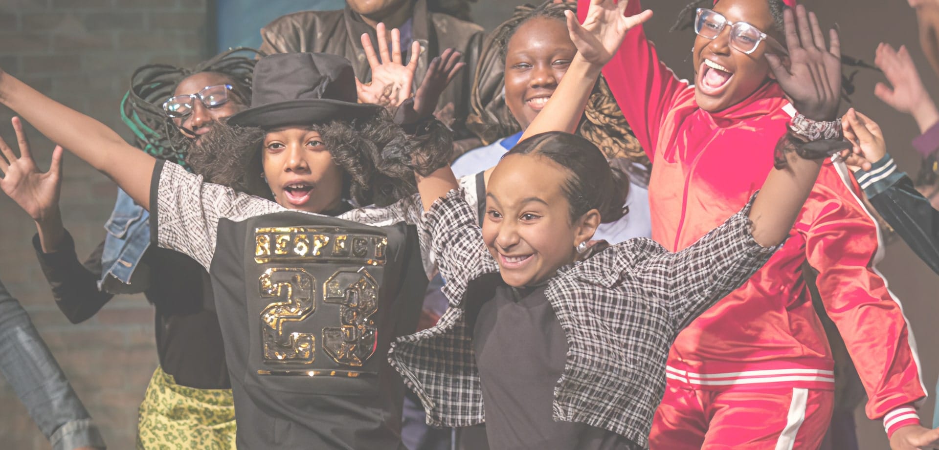 Background image for HSA's case study showing children dancing