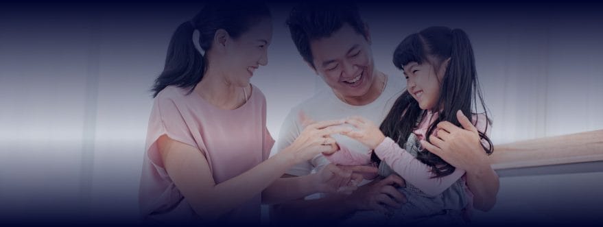 Background image for Project Fire Buddies' case study showing a mother and a father playing with their daughter