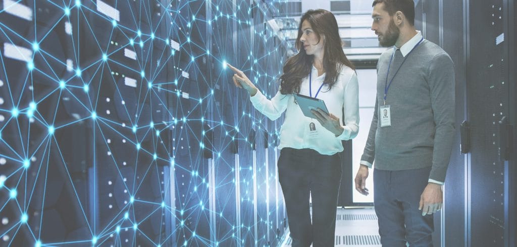 Background image for VarData's case study showing a man and a woman in front of abstract data