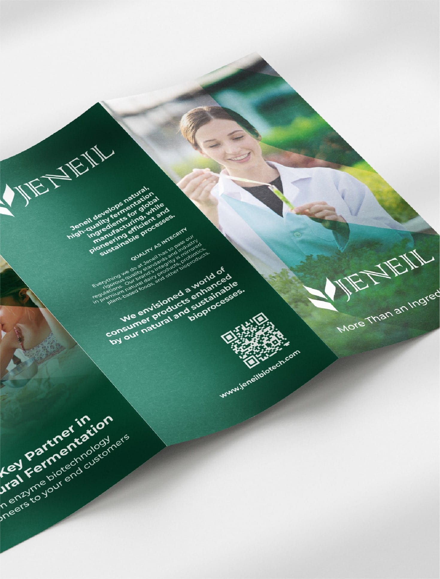 Open tri-fold brochure mockup for Jeneil, featuring green branding, a photo of a lab professional holding a plant sample, product messaging, a QR code, and website details