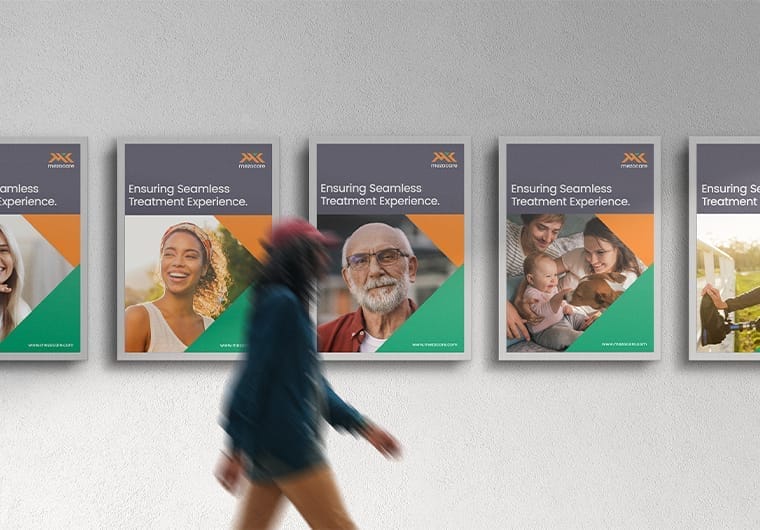 A row of framed healthcare posters displayed on a wall, each featuring patient-focused imagery and consistent branding