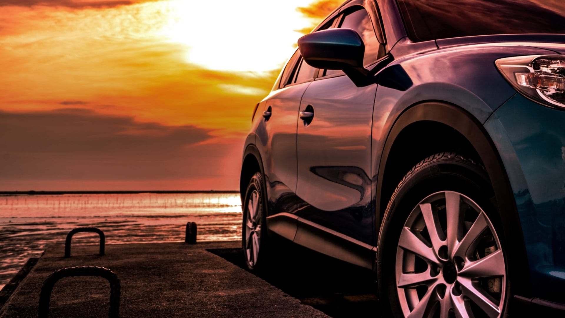 digital-marketing-agency-auto-repair A close-up shot of a car with a sunset in the background
