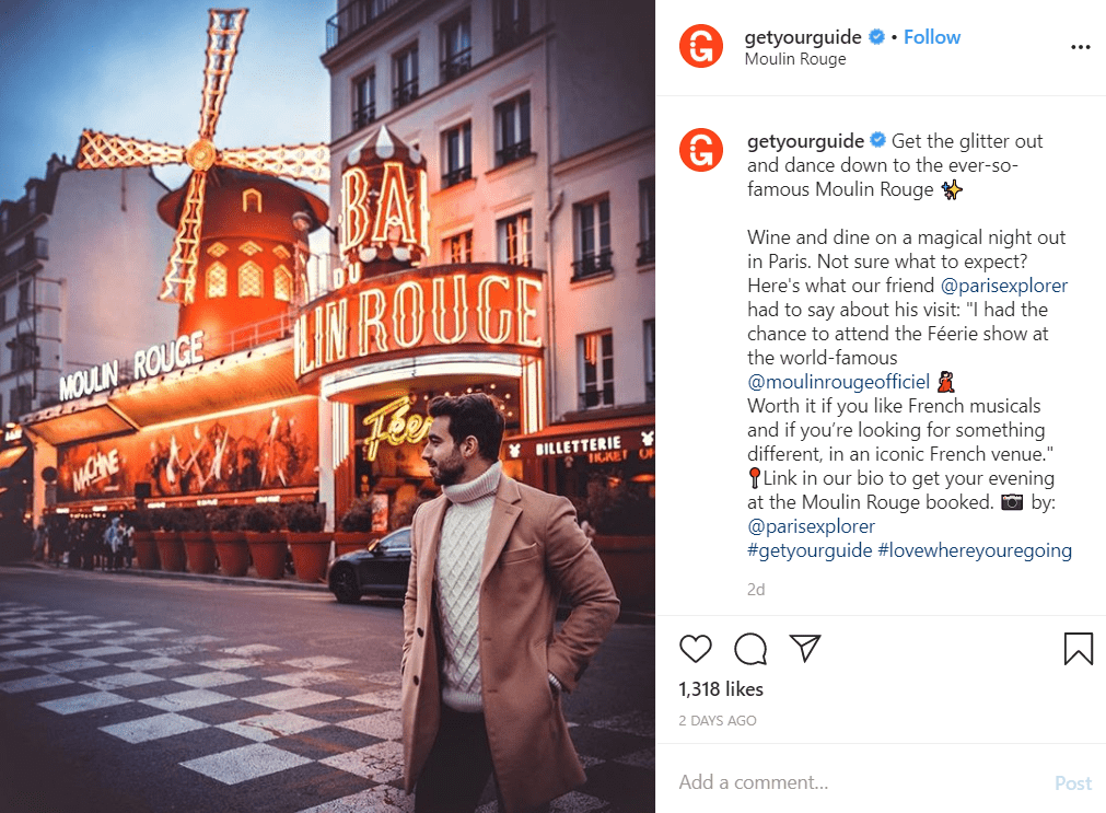 How 5 Emerging Tech Brands Use Digital Marketing To Grow Their Customer Base 8 Instagram post by GetYourGuide, showing a man standing outside Moulin Rouge in Paris