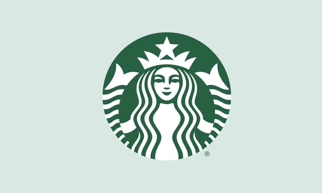 How To Build A Strong Brand In 2025: 6 Steps To Success 1 A green and white Starbucks logo picturing a smiling woman with long wavy hair and a crown