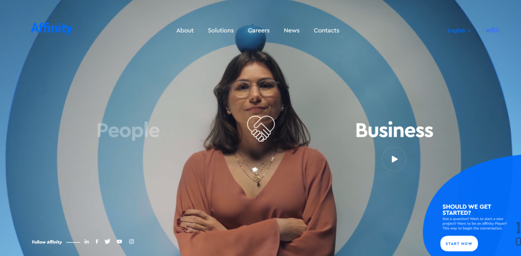 Best Website Animations: Trends, Techniques & Top Examples 6 Featured image - Affinity's landing page and a picture of a woman standing with a blue apple on her head.